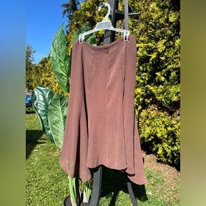 long brown skirt with zipper in the back ready to be added to your wardrobe ❤️